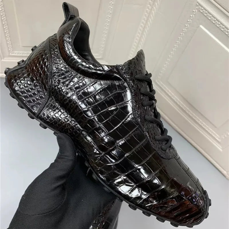 Close-up of genuine crocodile leather texture on TREKHE mid-top sneaker upper