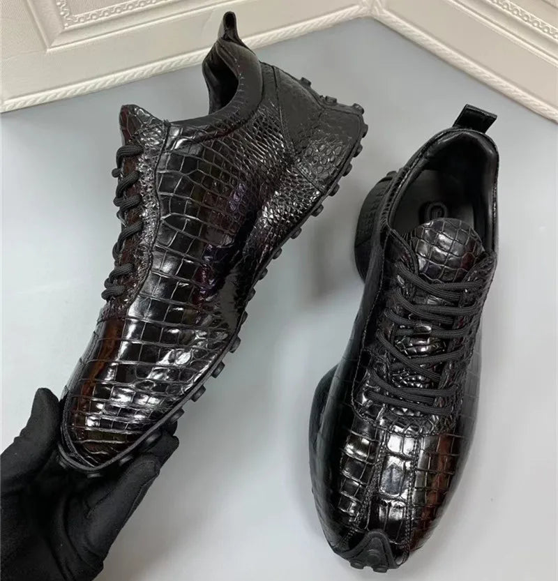 TREKHE crocodile leather sneaker showing rubber outsole and side profile